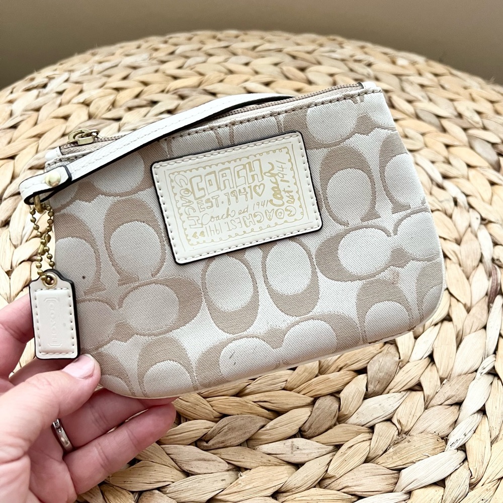 COACH canvas monogram wristlet